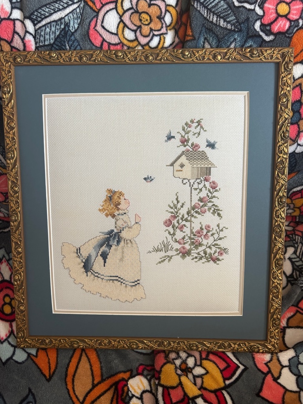 Framed Blue and Cream Cross-Stitch Wall Art - Classic Girl & Birdhouse